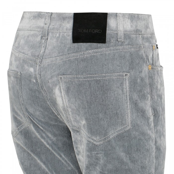 Stone washed flock denim skinny pants